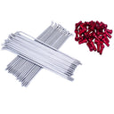 A set of stainless spokes along side red alloy nipples